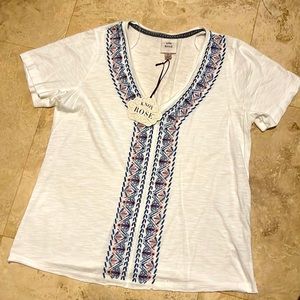 Loose white shirt with blue embroidery - size Medium.